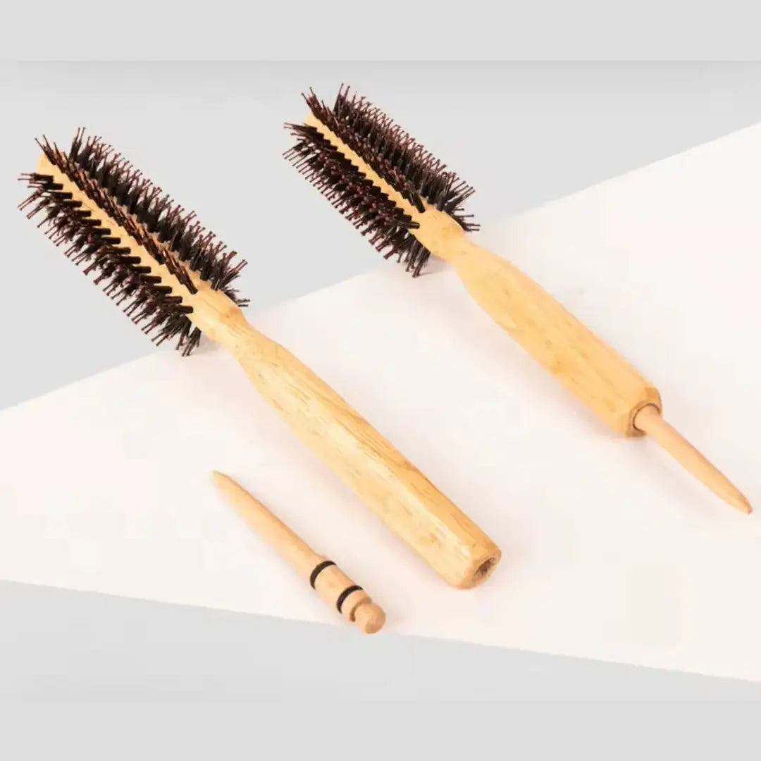 Two wooden hairbrushes with bristle heads